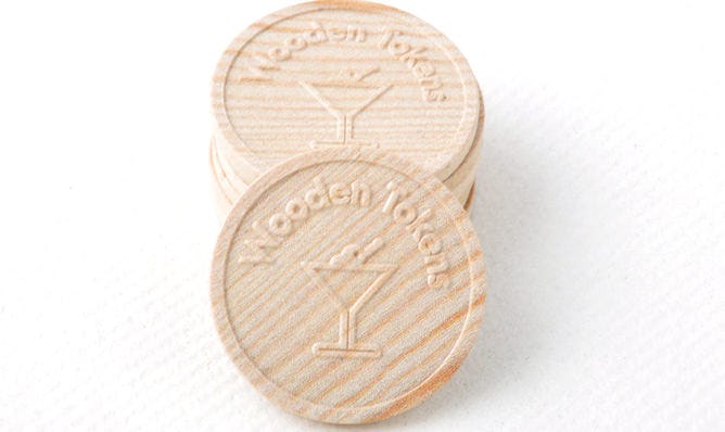 Wooden tokens embossed